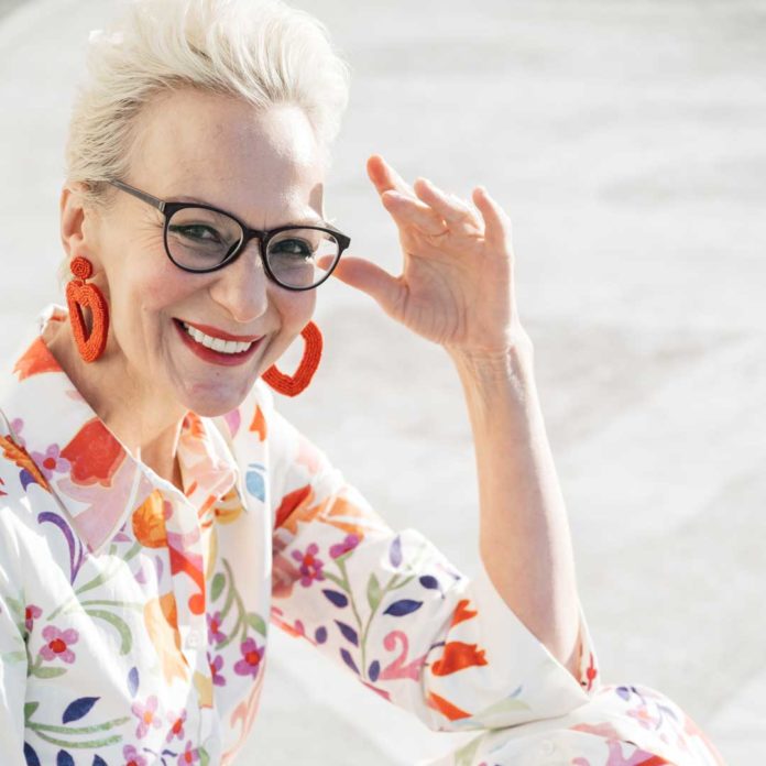 70 Years Woman Looks Happy In Glassess
